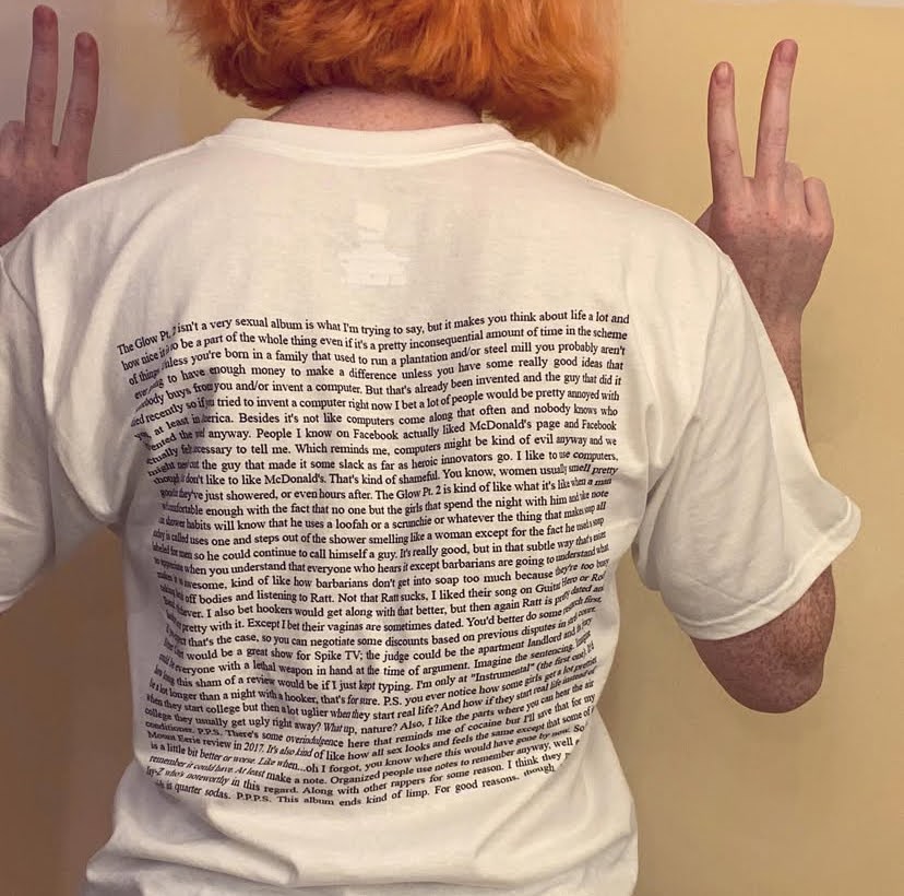 The back of the shirt being worn by emily